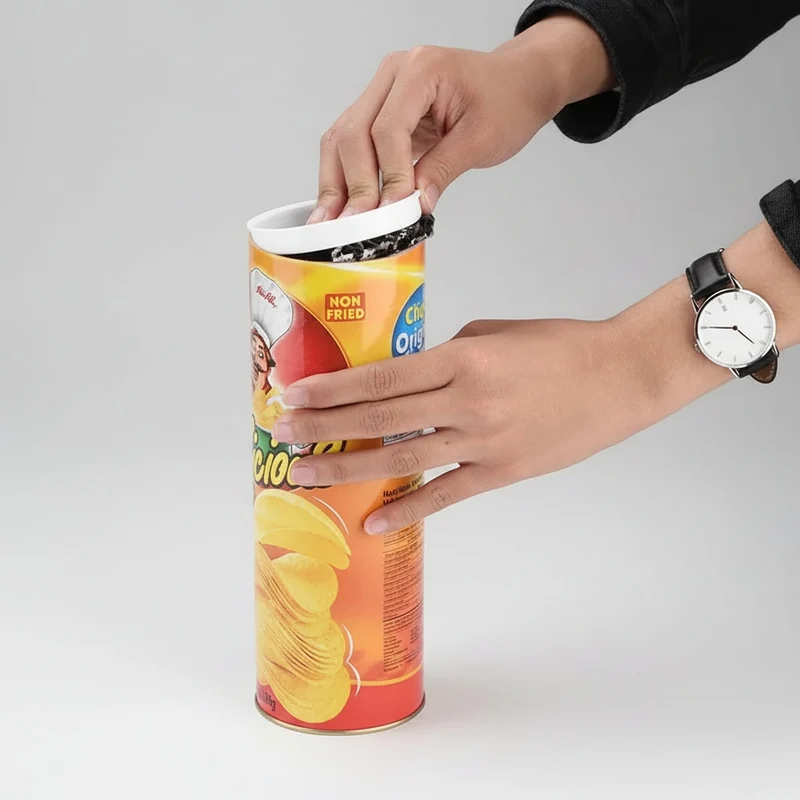 Halloween prank: spring-loaded snake jumping out of a can, chips—trick or treat after the chips