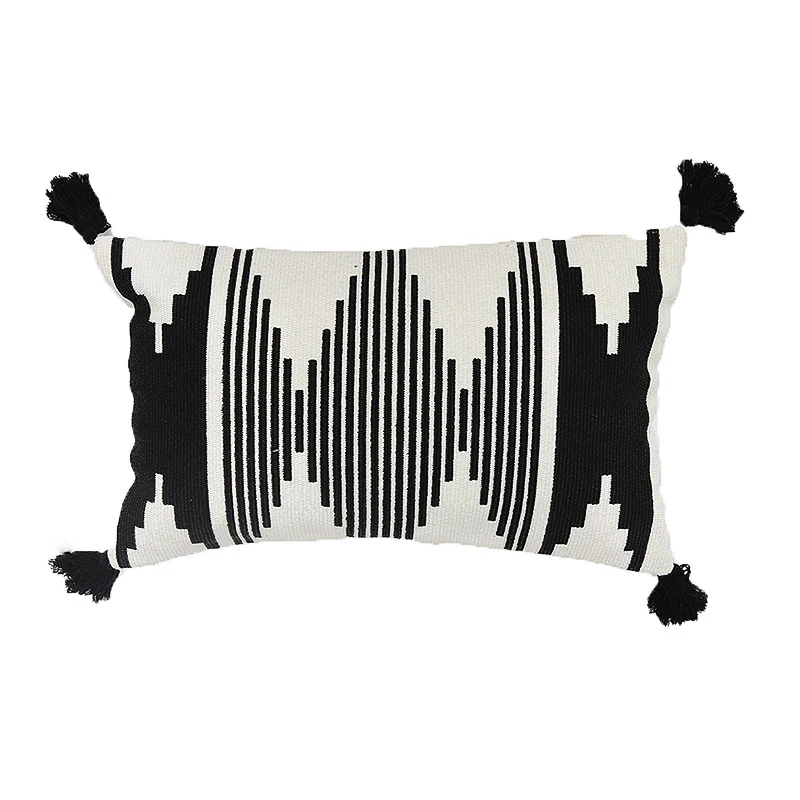 Rechteckiger Jacquard-Lumbarkissenbezug mit geometrischem Ethno-Relief und dekorativen Quasten Karnz