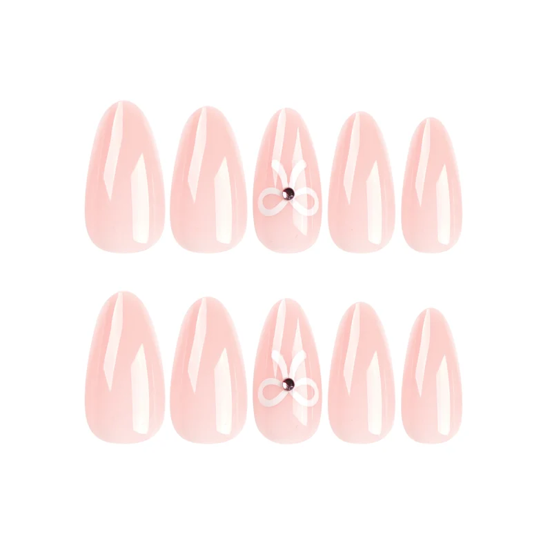 Kunstvolle Nagelverlängerungen mit Schleifenverzierung Karnz