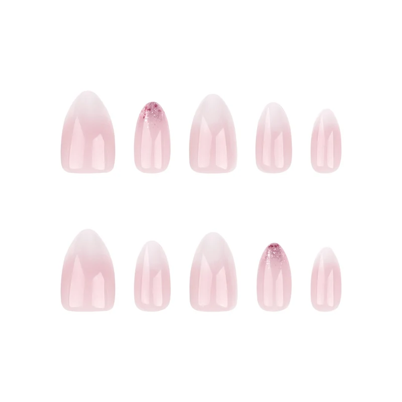 Kunstvolle Nagelverlängerungen mit Glitzerverzierung und Ombre-Effekt Karnz