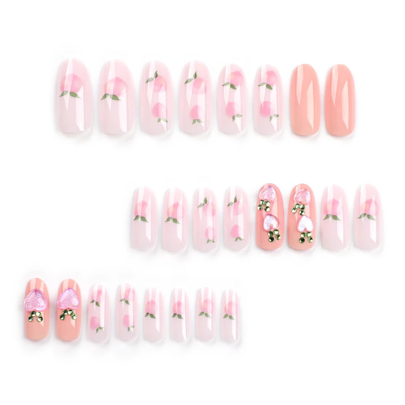 Kunstvolle Nagelkunst mit Frucht- und Glitzermotiven Karnz