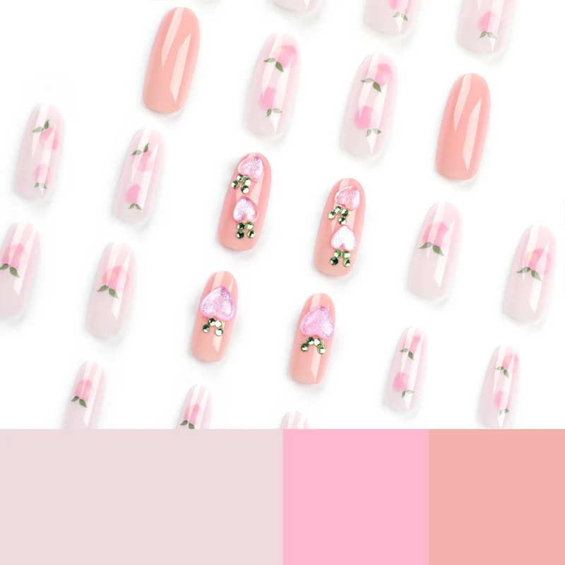 Kunstvolle Nagelkunst mit Frucht- und Glitzermotiven Karnz