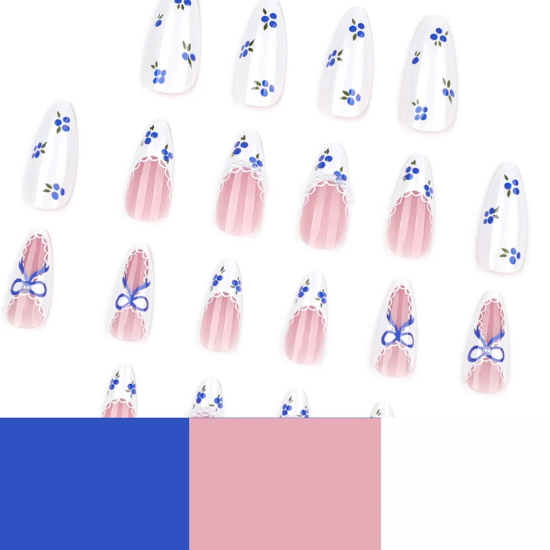 Kunstvolle Nagelkunst mit floralen Akzenten und Schleifenverzierung Karnz