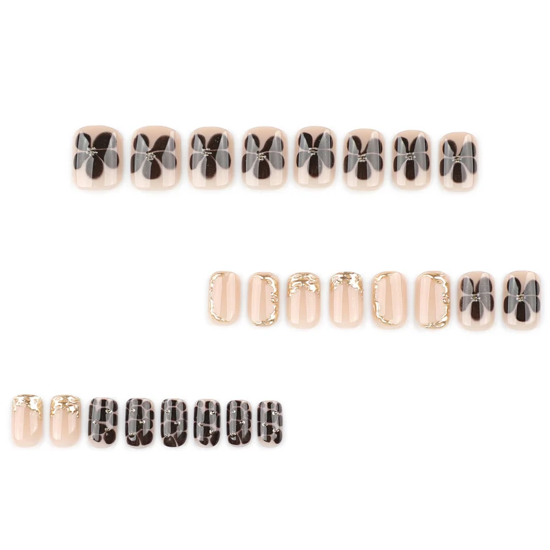 Kunstvolle Nagelkunst mit eleganten goldenen Akzenten Karnz