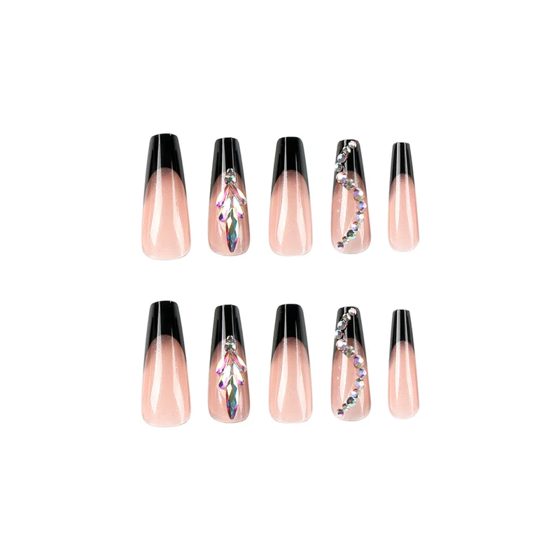 Kunstvolle Stiletto-Nägel mit Glitzerverzierungen Karnz