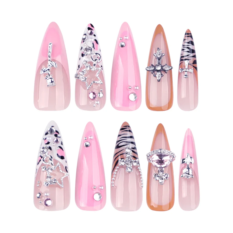 Kunstvolle Stiletto-Nägel mit Glitzer- und Strassverzierungen Karnz
