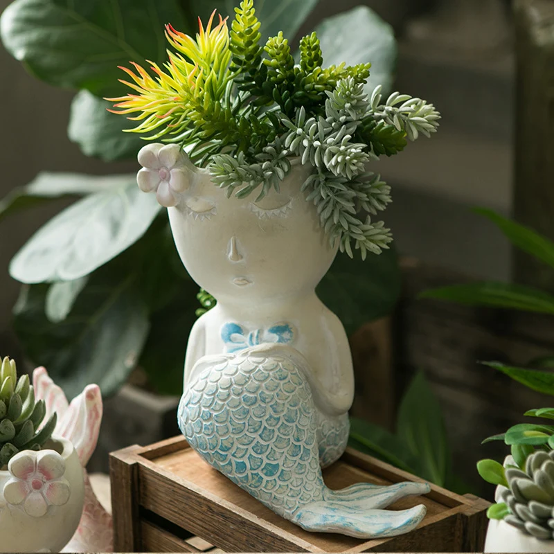 Künstlerische Blumengefäße Karnz