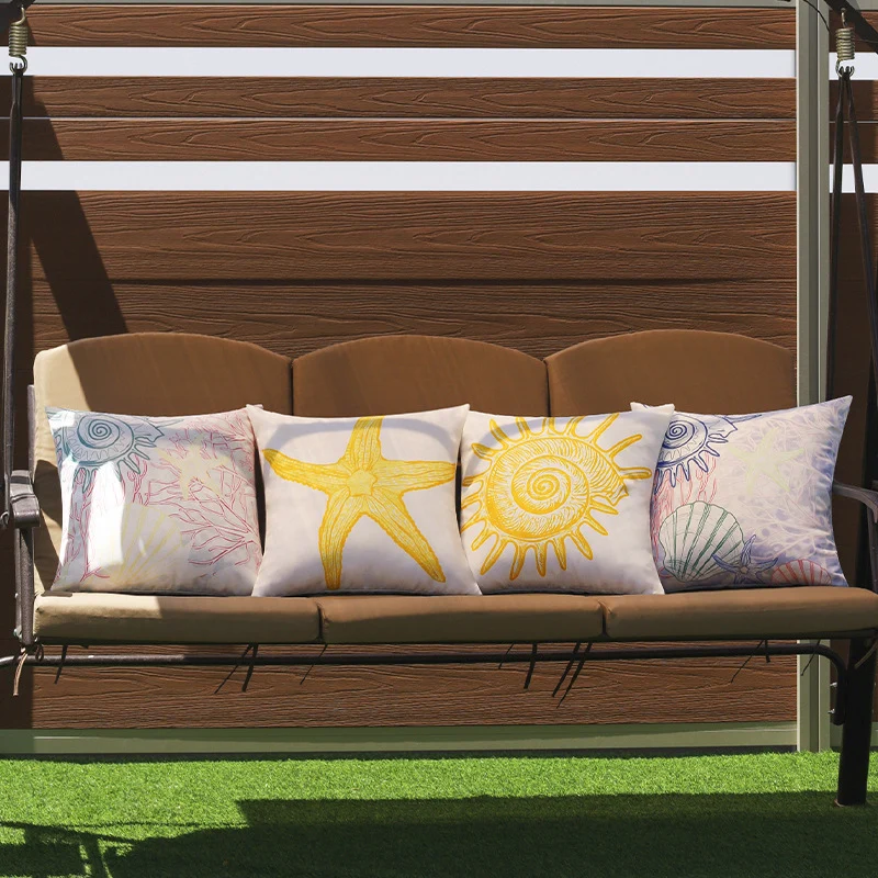 Quadratischer Outdoor-Kissenbezug mit großflächigem Seestern‑Motiv aus wasserabweisendem Polyester Karnz