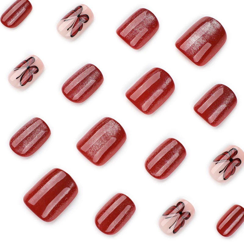 Kunstvolle Nagelgestaltung mit Schmetterlingsmotiven Karnz