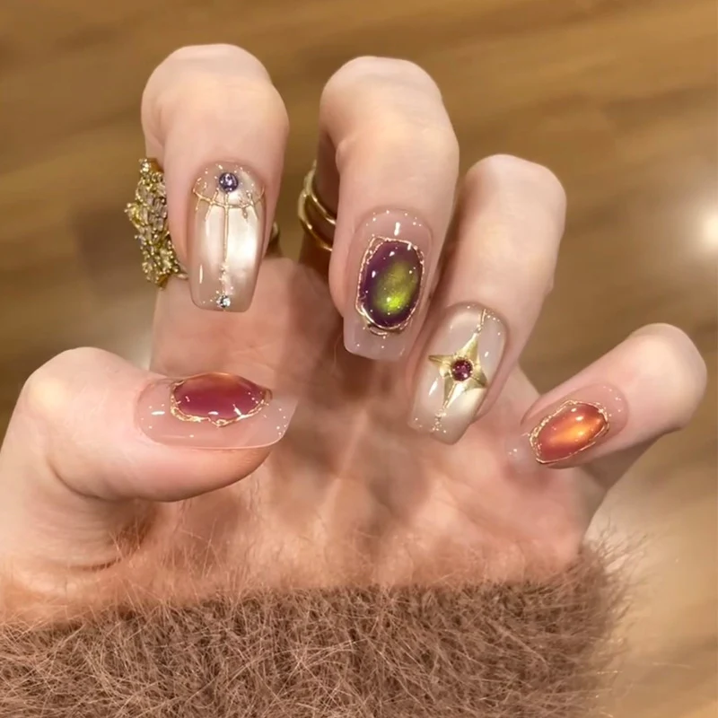 Dekoratives Press-On-Nagelset mit Stern- und Schleifenmotiven Karnz