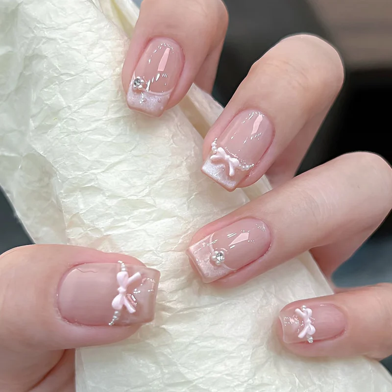 Dekoratives Press-On-Nagelset mit Stern- und Schleifenmotiven Karnz