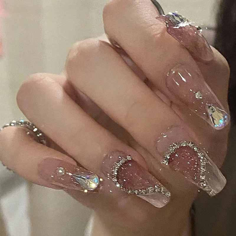 Dekorativer Press-On-Nagelset mit eleganten Edelstein-Accents Karnz