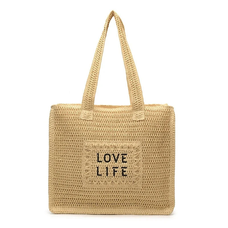 Gewebte Strohtasche mit inspirierendem Druck