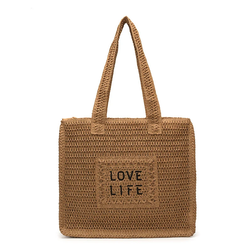 Gewebte Strohtasche mit inspirierendem Druck