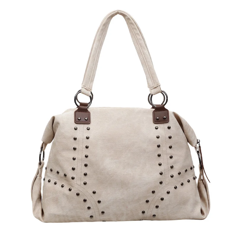Stylische Wildleder-Tote-Handtasche mit dekorativen Nieten