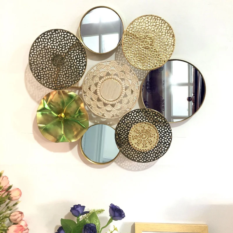 Dekorative Metallwandkunst mit tropischem Blatt- und Spiegeldesign Karnz