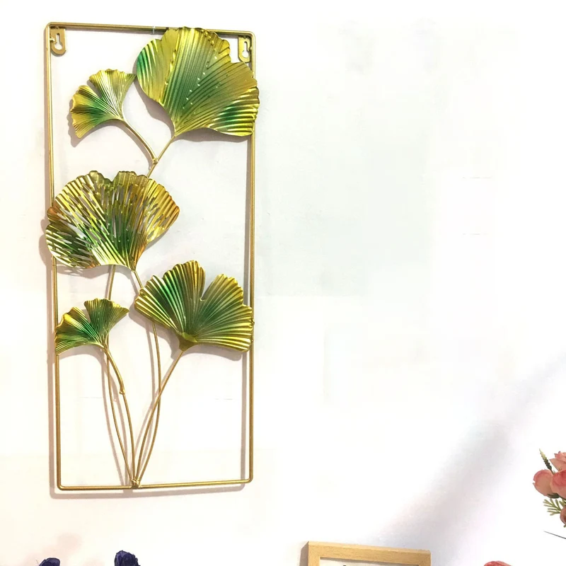Dekorative Metallwandkunst mit tropischem Blatt- und Spiegeldesign Karnz