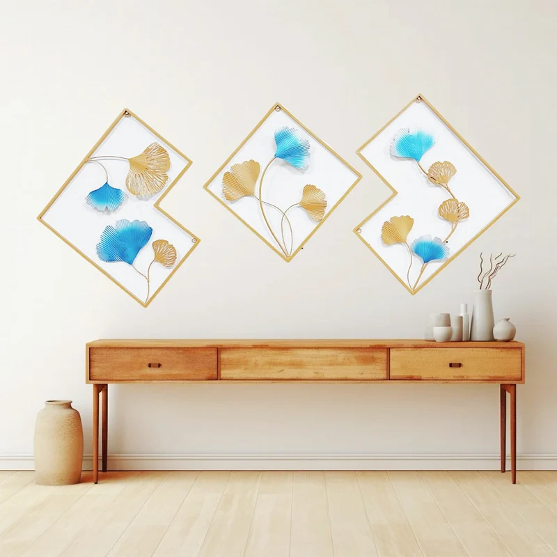 Dekoratives Metall Wandkunst Set mit Ginkgo-Blatt und floralem Design Karnz