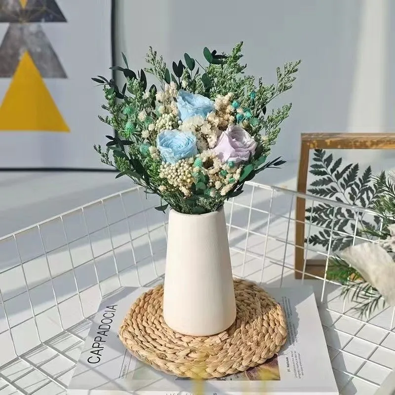 Elegante dekorative Schein- Blumenanordnung