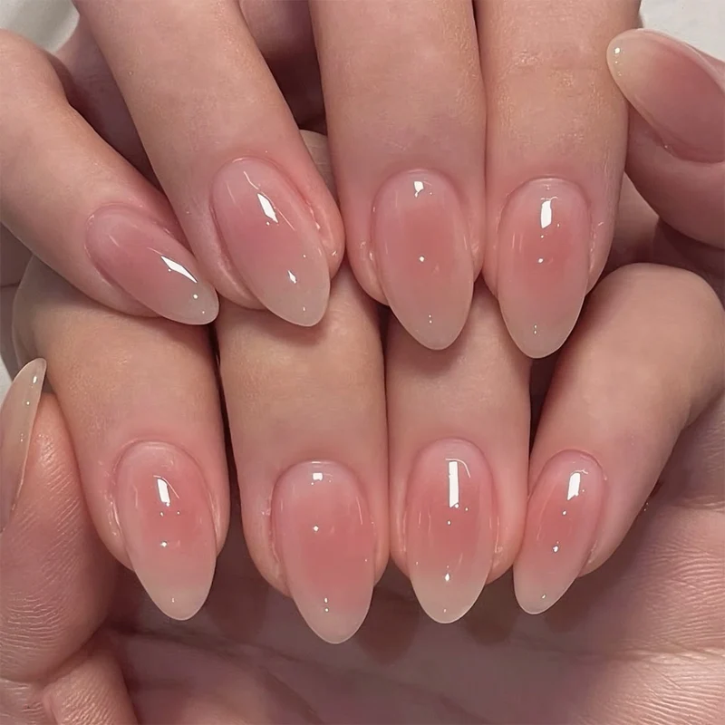 Künstliche Nagelkunst mit verspielten Punkten und Schleifen Karnz