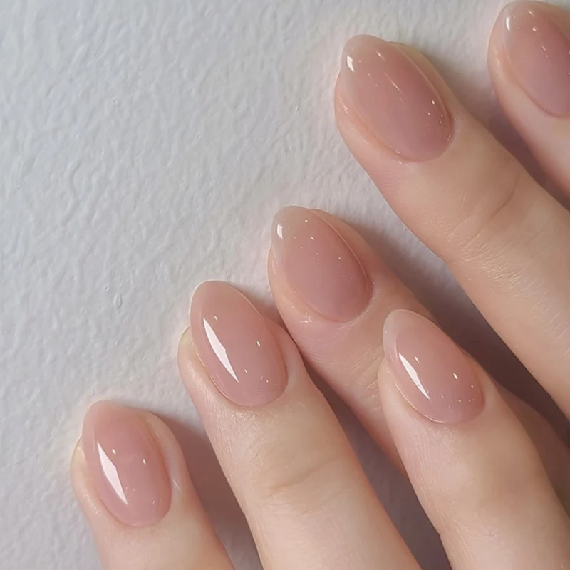 Künstliche Nagelkunst mit verspielten Punkten und Schleifen Karnz