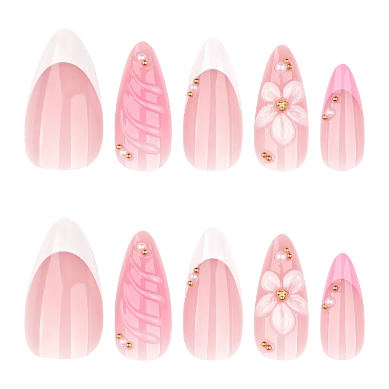 Künstliche Nagelkunst mit Floral-Design und Glitzerakzenten Karnz