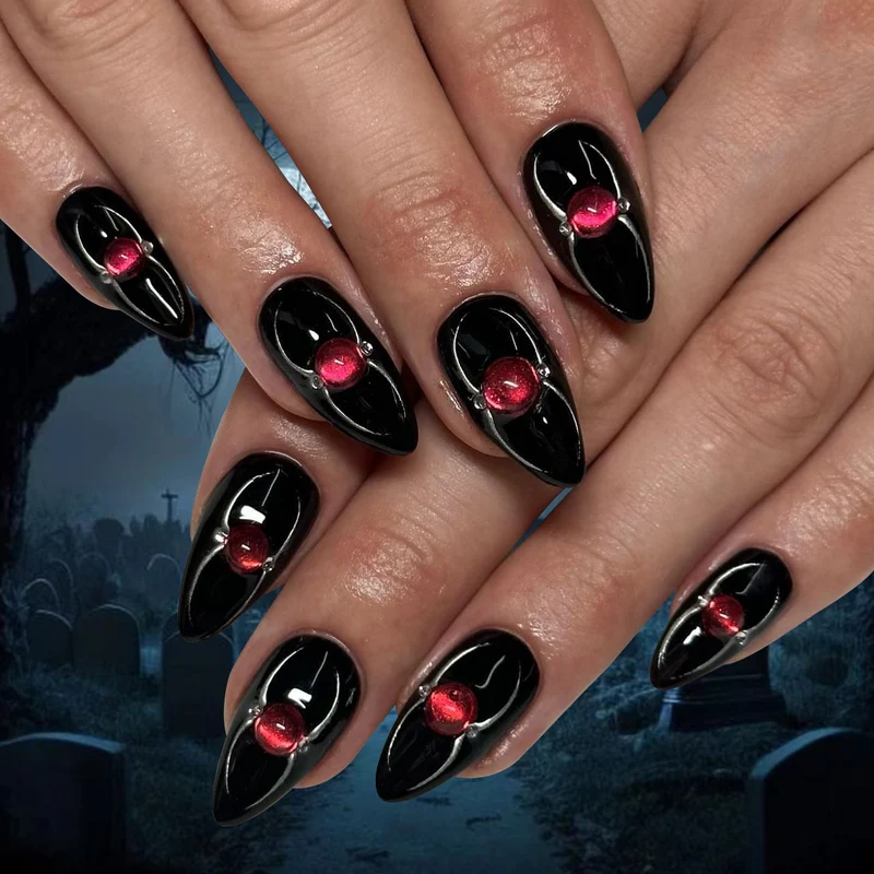 Kreative Stiletto-Nagelkunst mit blutroten Akzenten Karnz