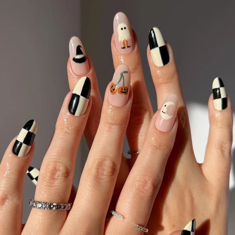 Kreative Stiletto-Nagelkunst mit blutroten Akzenten Karnz