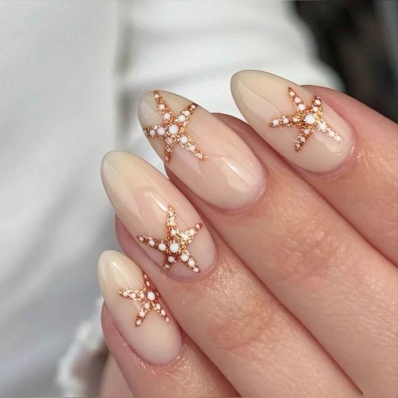 Glamouröse Stiletto-Nägel mit elegantem Sternen-Design Karnz