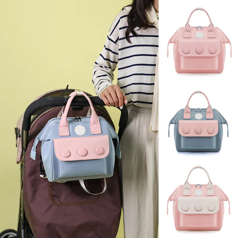 Elegante isolierte Wickeltasche Karnz