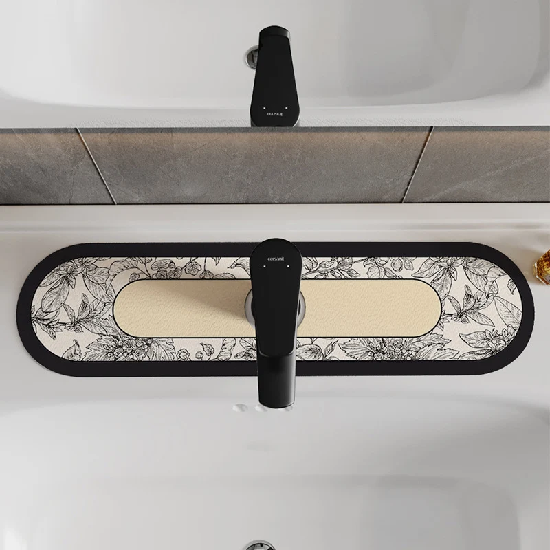 Decorative Oval Silicone Faucet Splash Guard Mat with Floral Engraved Print and Non-Slip Backing