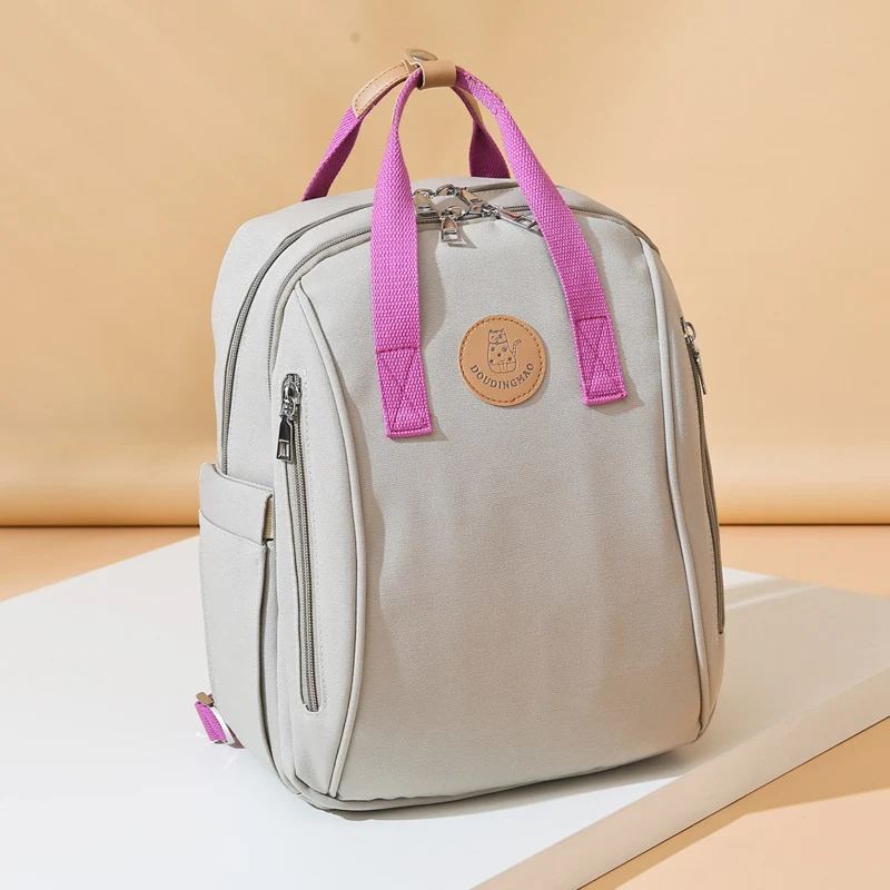 Vielseitiger Mehrfachfach Baby-Pflege-Rucksack Karnz