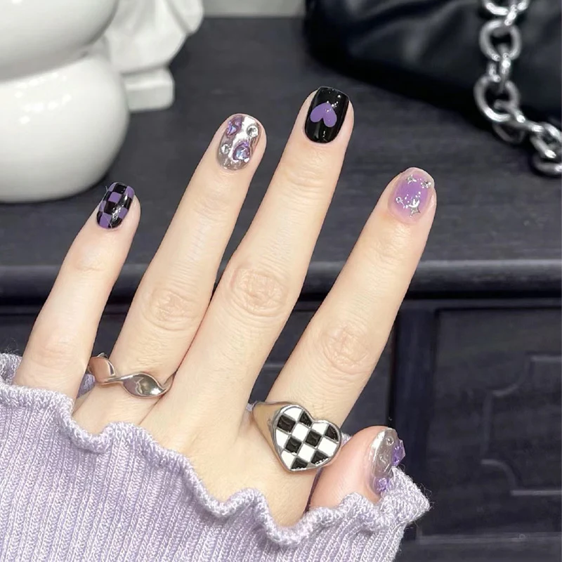 Künstlerisches Press-On Nail Set mit Herz- und Stern-Designs Karnz 1789389240