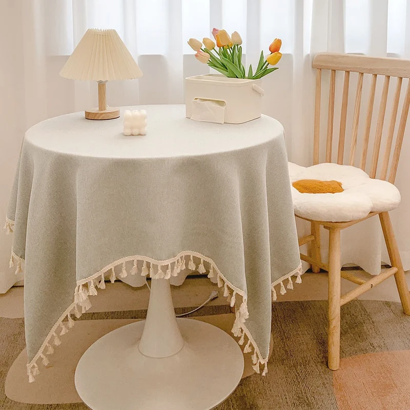 Runde strukturierte Tischdecke mit Quastenbesatz und Leinen-ähnlichem Drapierfinish