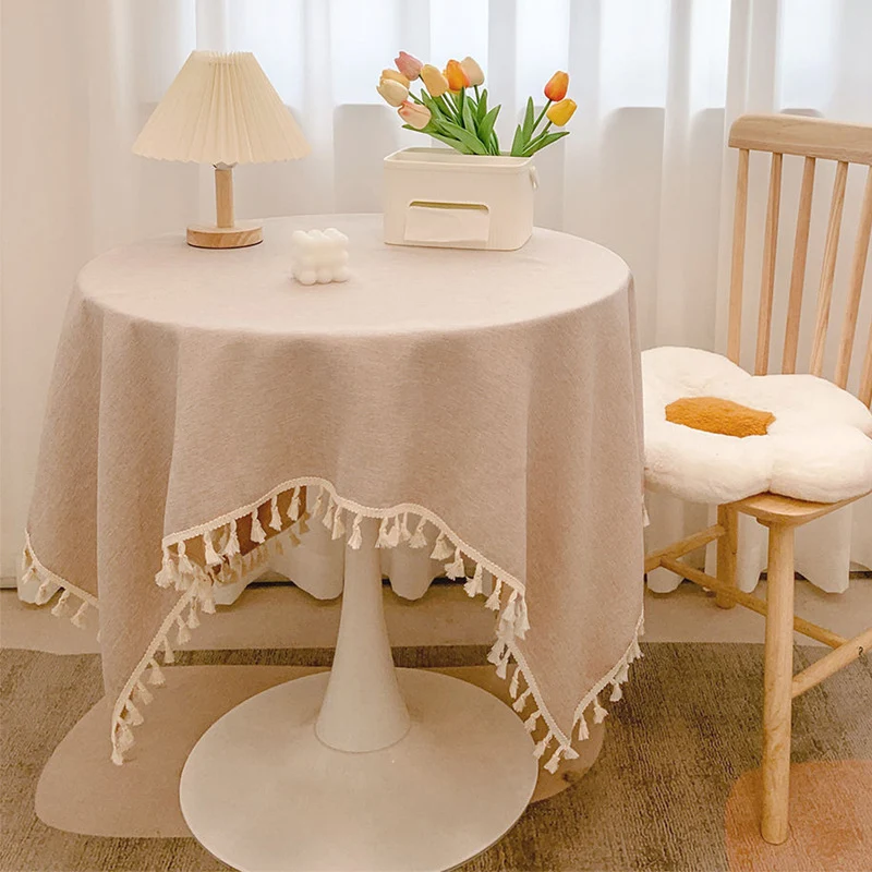 Runde strukturierte Tischdecke mit Quastenbesatz und Leinen-ähnlichem Drapierfinish