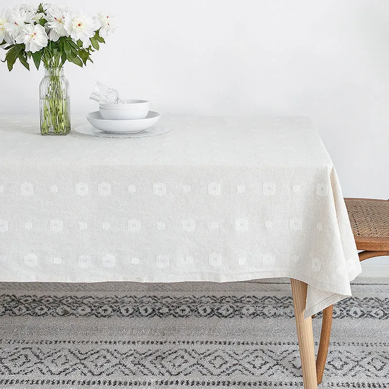 Tischdecke aus Baumwollmix mit geprägtem Quadrat‑ und Kreisrelief Karnz