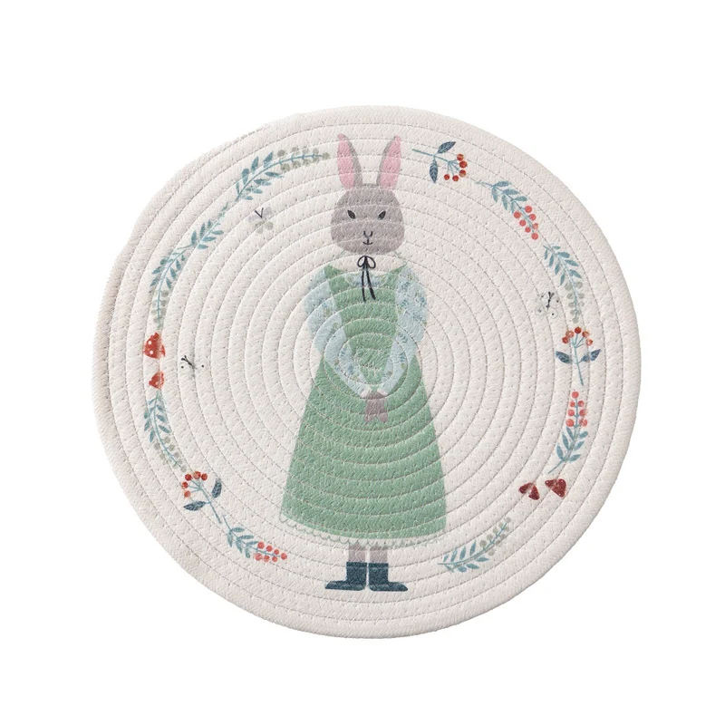Rundes Tischset aus gewebter Baumwolle mit niedlicher Nashorn-Illustration und floralem Kranz Karnz