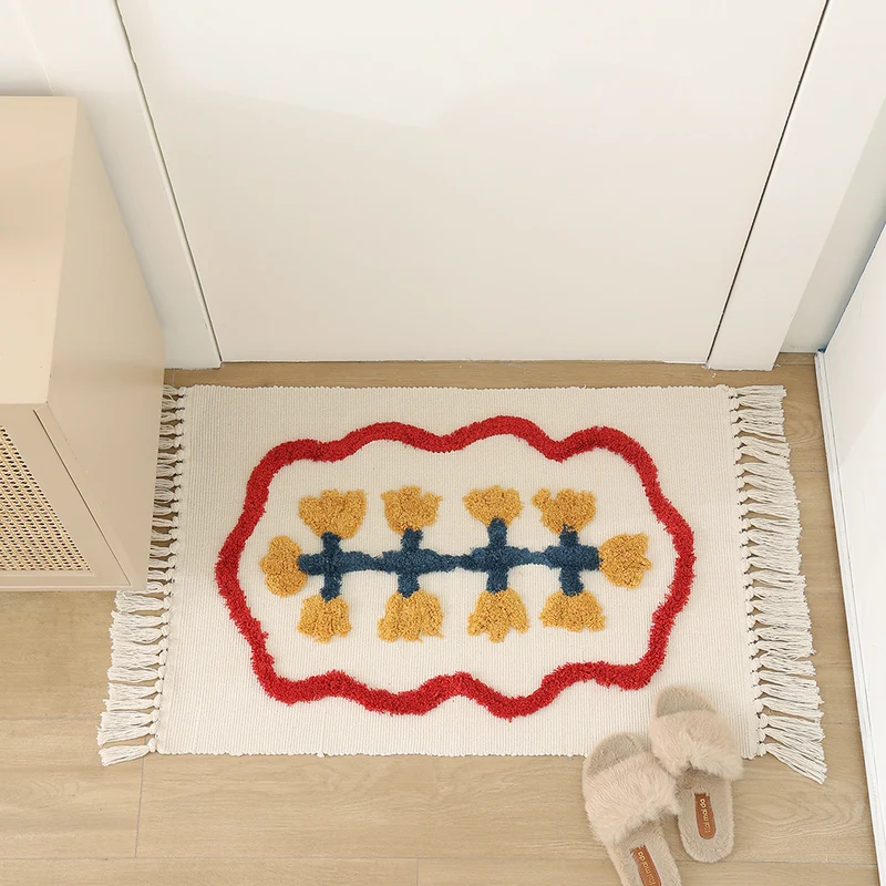Handgewebter Baumwoll-Badmattenteppich mit Tufting-Blumenapplikation und Quasten Karnz