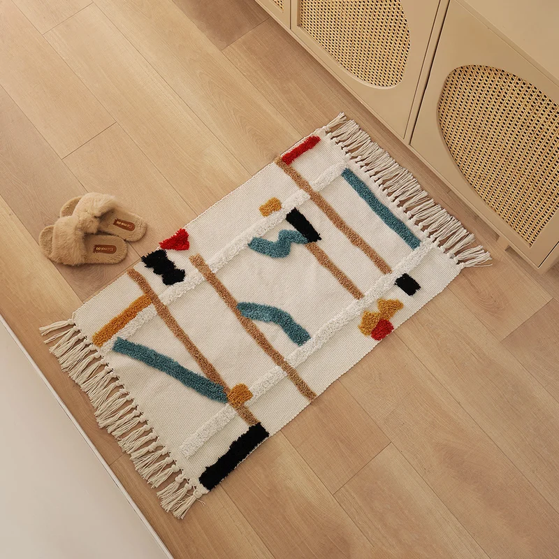 Gewebter Vorleger im Boho-Minimalstil mit kontrastiertem Tufting und Baumwollfransen Karnz