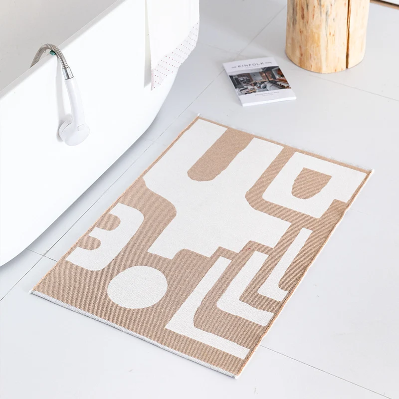 Flachgewebte Badematte mit abstraktem Geometriemuster Karnz