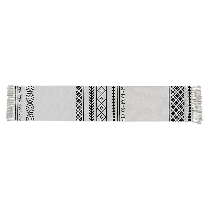 Boho-Tischläufer aus Baumwollmix mit gewebtem Ethno-Jacquard und dekorativen Fransen Karnz
