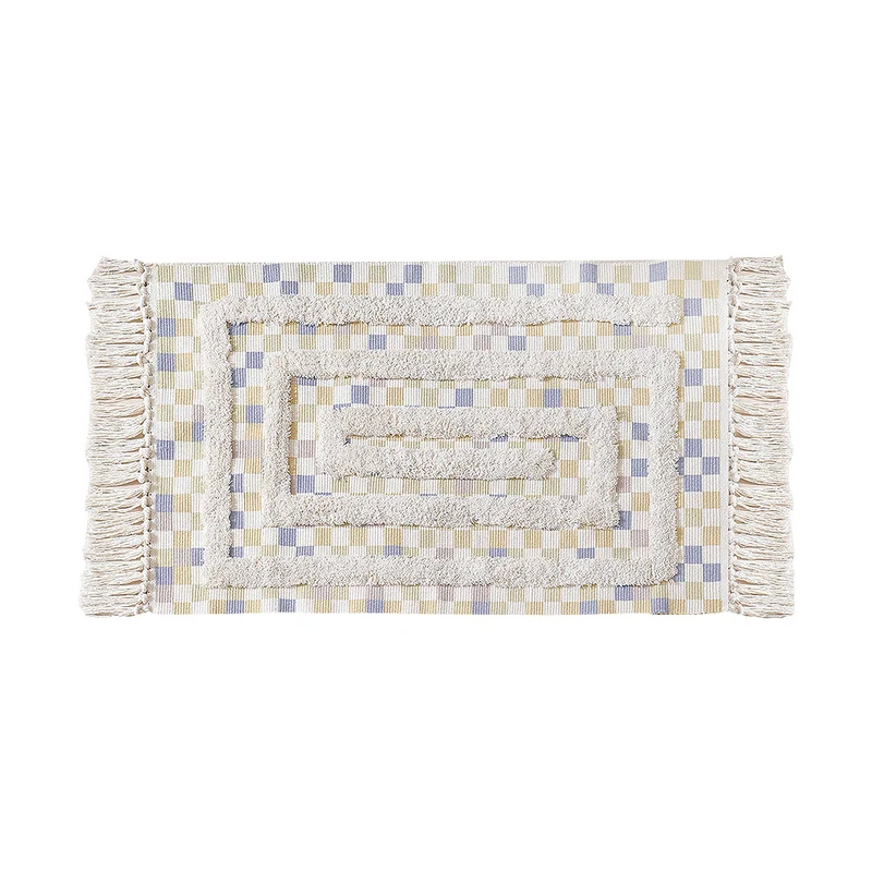 Handgetuftete Badezimmermatte mit Fransen, dekorativem Punkt‑und Strichmuster und rutschfester Unterseite Karnz