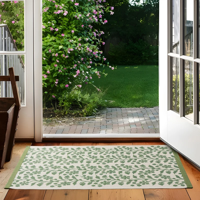Gewebter Tischläufer mit floraler Vinyldruck-Optik und verstärkter Kettelung Karnz