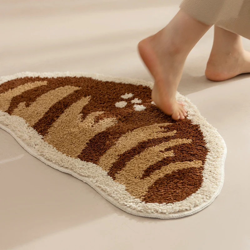 Badezimmer‑Badematten‑Set Karnz mit handgetuftetem Keks- und Brot‑Design, weichem Mikrofaser‑Flor und rutschfester Gummiunterseite