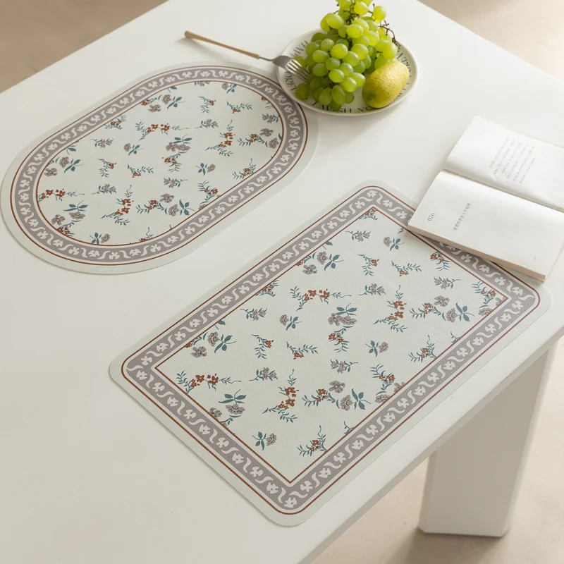Abwischbare Tischsets aus PU‑Leder mit botanischem Silhouetten‑Design Karnz