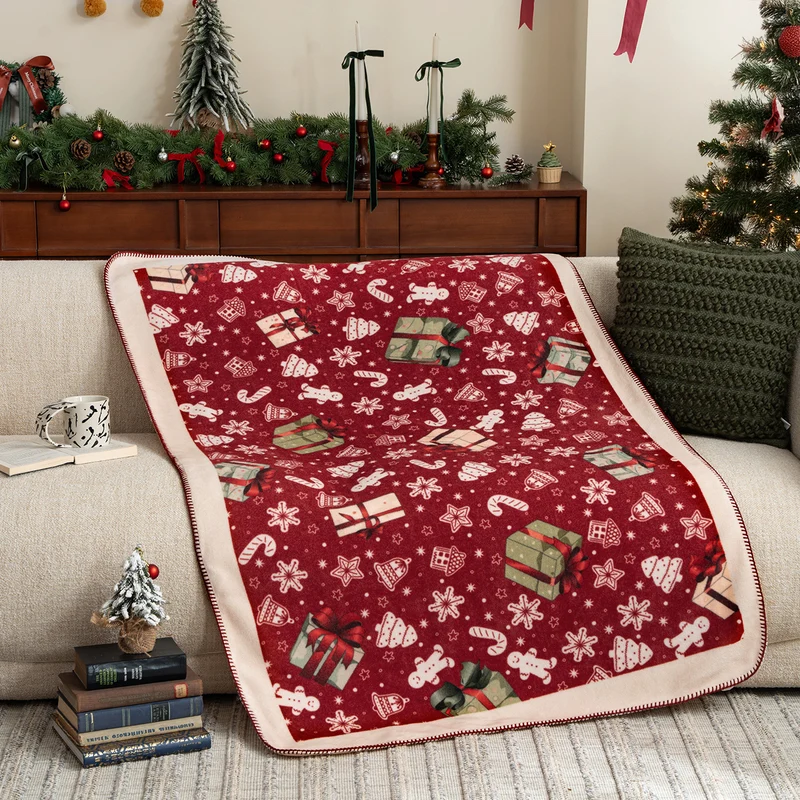 Weiche Weihnachts-Fleecedecke mit Geschenk- und Lebkuchenmotiv Karnz