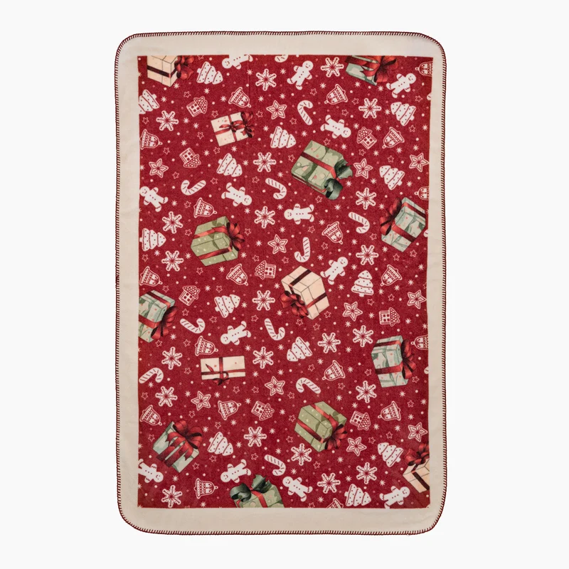 Weiche Weihnachts-Fleecedecke mit Geschenk- und Lebkuchenmotiv Karnz