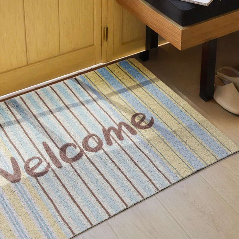 Strapazierfähige Eingangs-Fußmatte mit gestreifter Struktur und "Welcome"-Schrift Karnz