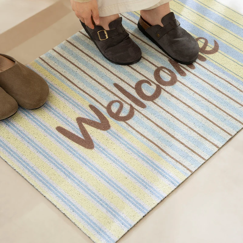 Strapazierfähige Eingangs-Fußmatte mit gestreifter Struktur und "Welcome"-Schrift Karnz