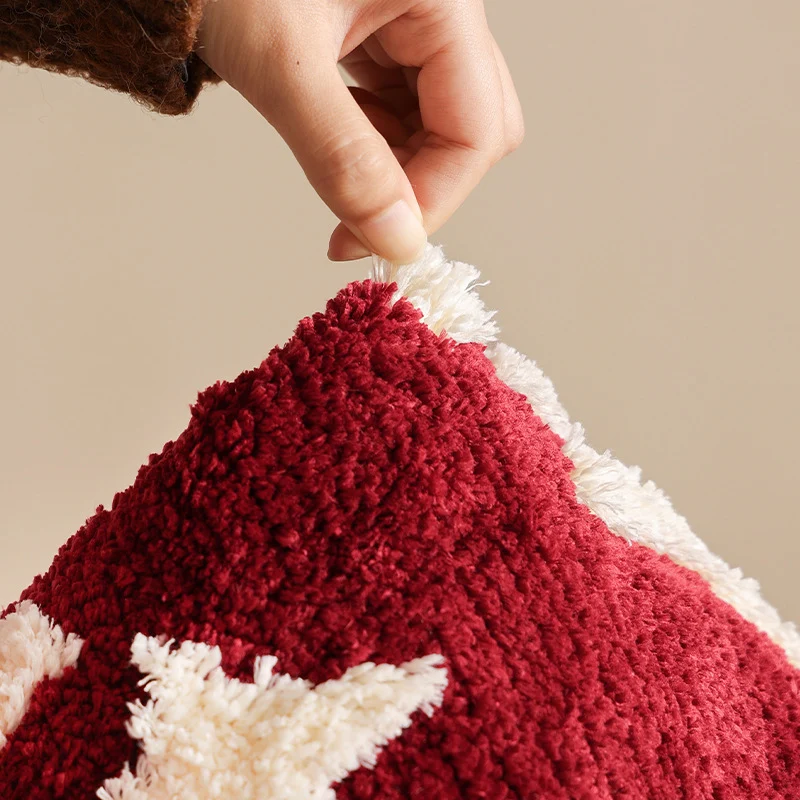 Geformter getufteter Zierteppich mit Schleifen- und Sternmotiv Karnz